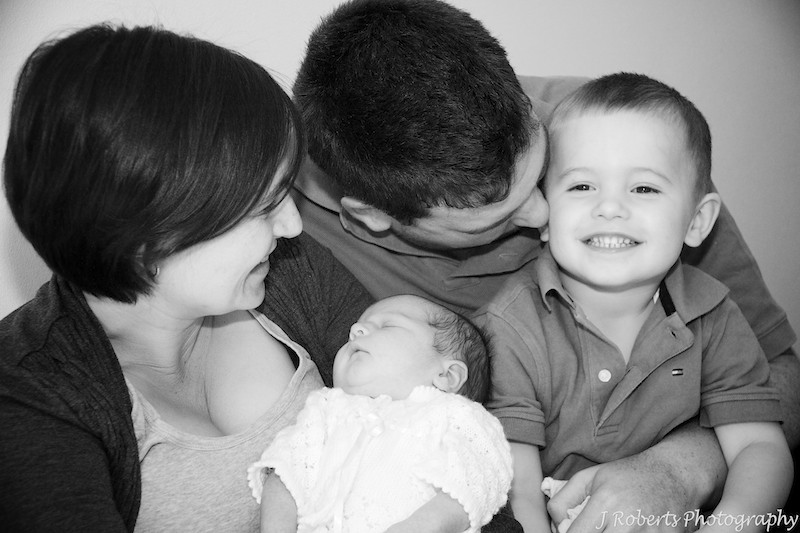 Family excited about a newborn baby - newborn baby portrait photography sydney